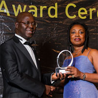 Felicia Twumasi receiving the Ernst & Young Award